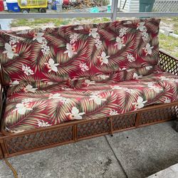 Rattan Futon With Tropical Floral Pattern Expands into Full Size Bed