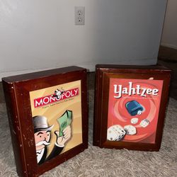 Vintage Monopoly (unopened) and Yahtzee games in collectors wooden book case