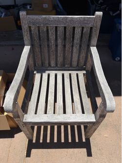 Wooden teak armchair outdoors