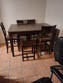 Table counter height with chairs and stools