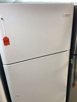 New scratch and dent Frigidaire 18 cu ft top and bottom fridge. 1 year warranty