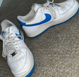 White Nike are forces with blue check