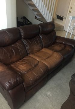 Real reclining leather sofa. Good shape.