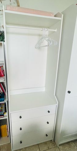 White closet with 3 drawers