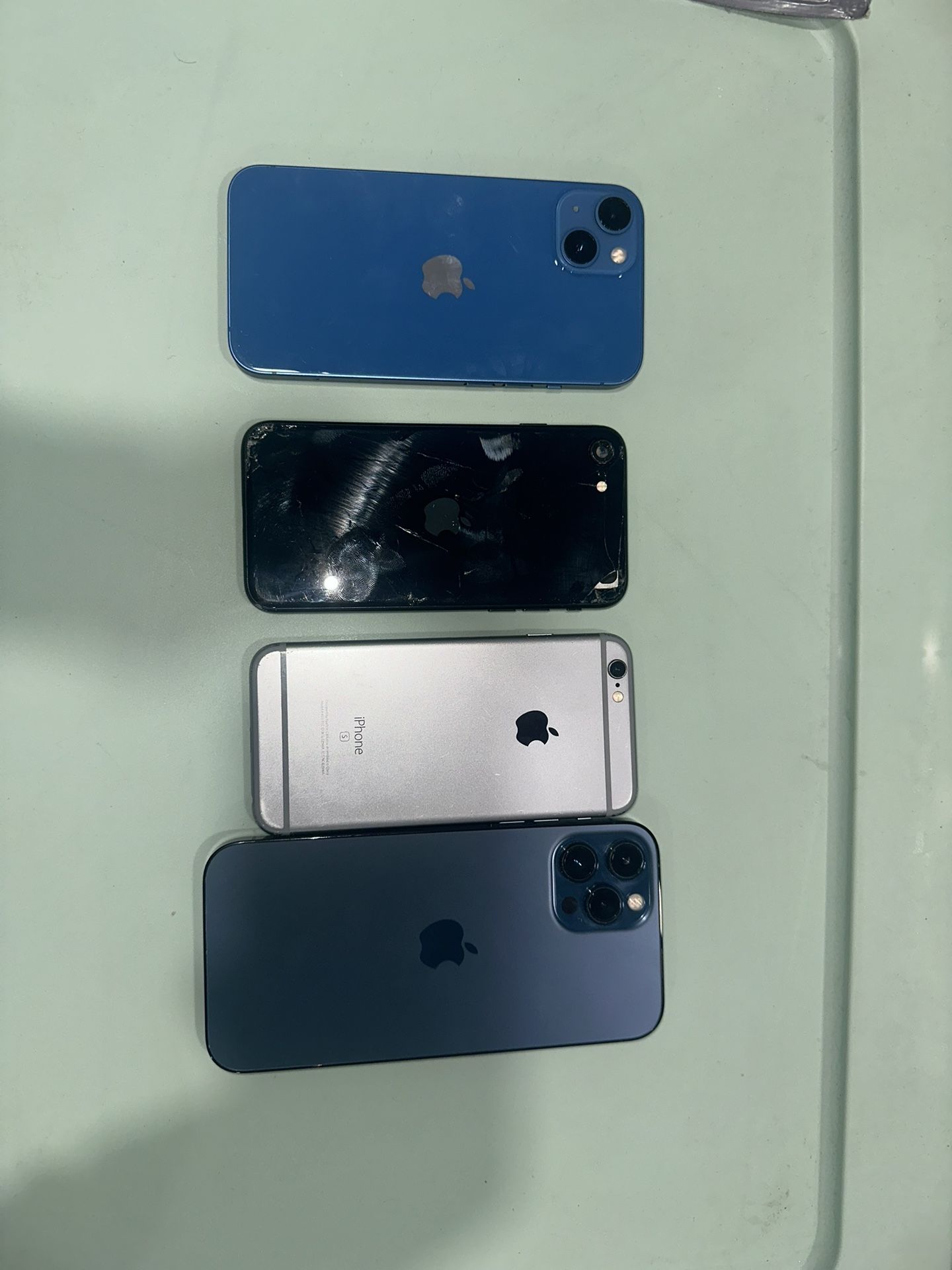 4 iPhones Locked/as Is/ Abandoned Property