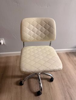 Cream adjustable chair