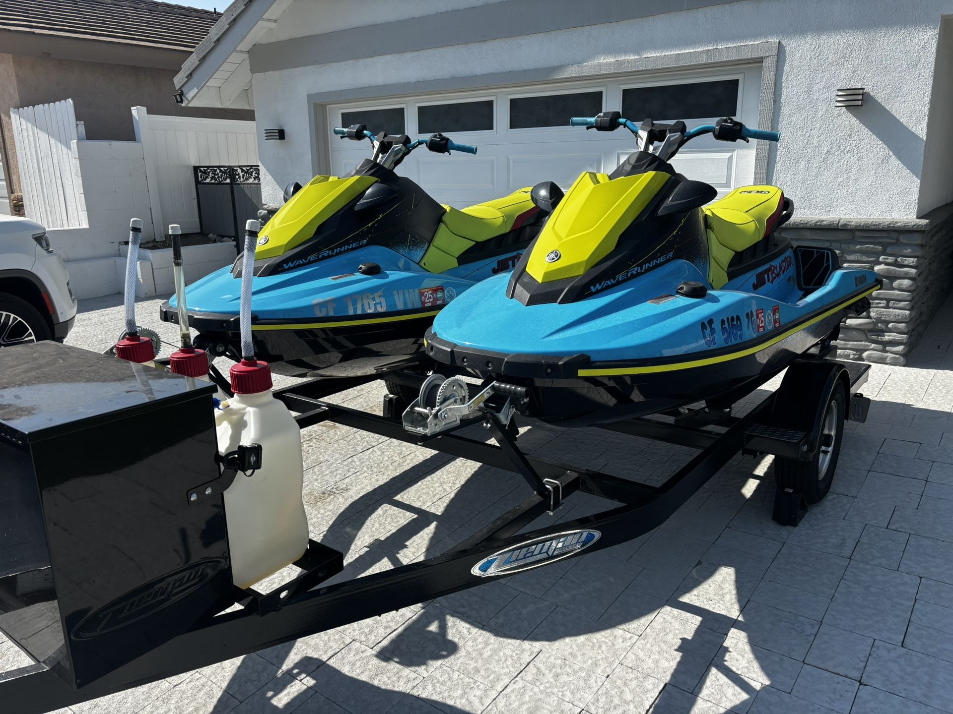 Pair of Jet Skis And New Trailer