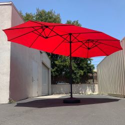 New in Box $130 Large Double Sided Outdoor (15ft Umbrella and 65lbs Plastic Base set) Colors Red/Gray
