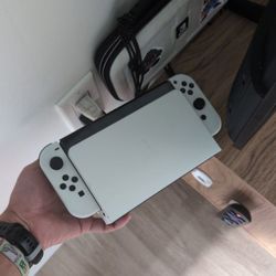 Nintendo switch OLED. Only 4 Months Old Minimal Use
