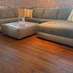 New 4 pc sectional sofa ,ottoman , pillows by Albany furniture