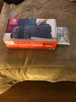 Nintendo switch with Super Smash Bros Ultimate