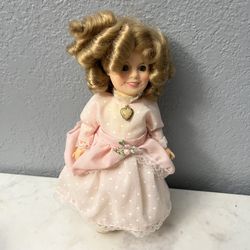 Vintage 1982 IDEAL Shirley Temple Doll.  Size appropriately 7 1/2 inches tall.  Preowned very good condition.