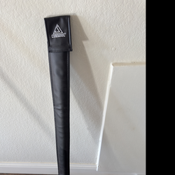 Pro pool cues (2) and unopened box of billiard balls