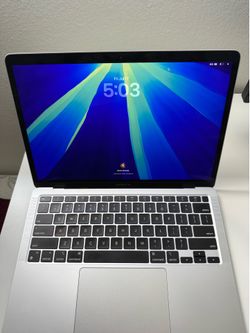 Apple MacBook Air 13.3” Laptop.  Apple M1 Chip - 8GB Memory - 256GB SSD - Silver