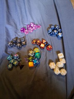 Dungeons and dragons dice five sets and few external pieces