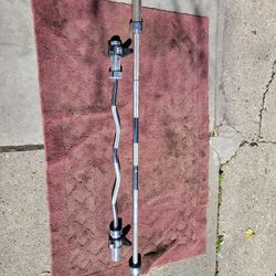 7'   OLYMPIC  2" HOLE  45LB BAR  AND EZ-CURL BAR 
7111. S. WESTERN WALGREENS 
$150 CASH ONLY AS IS 