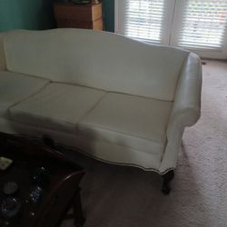 White faux leather sofa