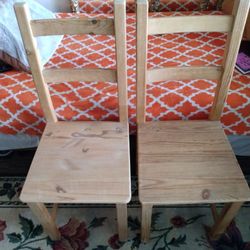 Two Solid Wood Chairs