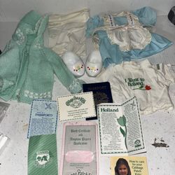 Vintage cabbage patch clothing and passport and papers