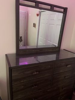 Dresser with glass top and mirror