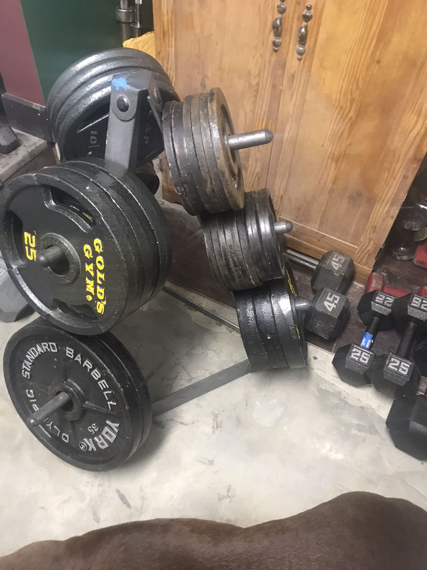 Olympic weights, weight tree, dumbbells 1.50 per pound
