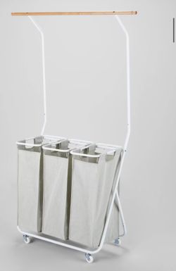 laundry hamper with hanger on top