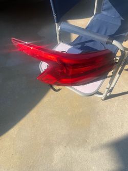 Nissan Maxima left tail light