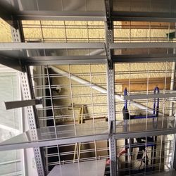 2 Sided Shelves Metal Rack “like New” Asking $150. Obo 