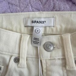 Cream high-waisted straight-leg jeans
