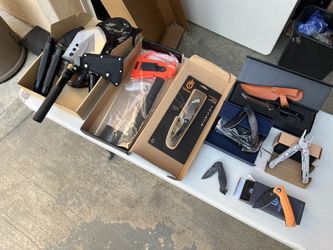 Assorted Outdoor Knives And Tools
