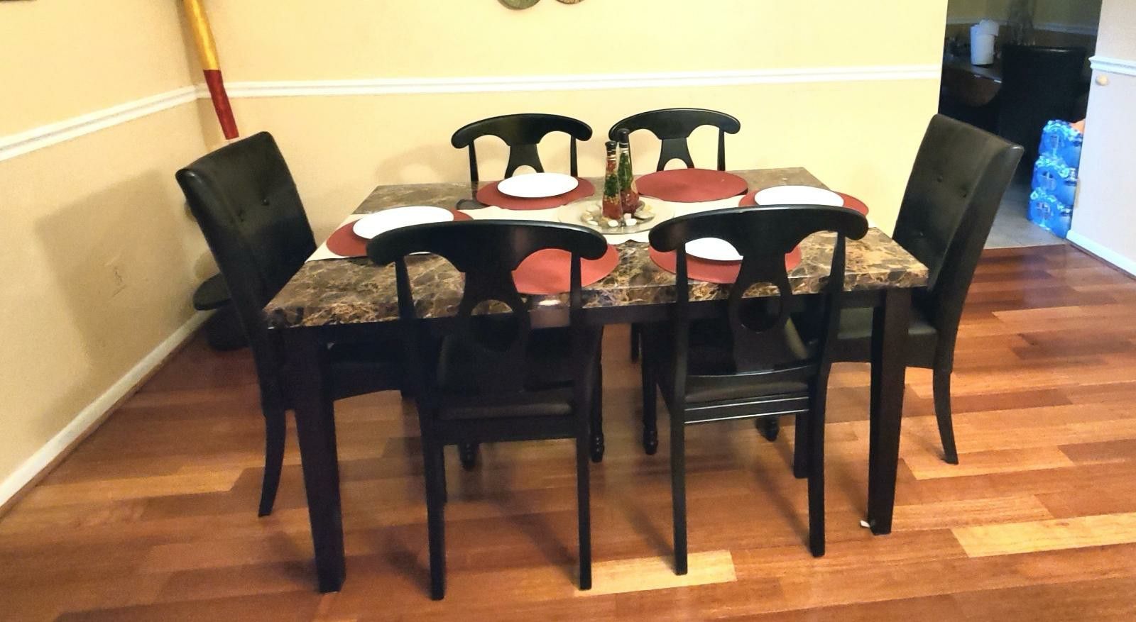Table and 6 leather chairs