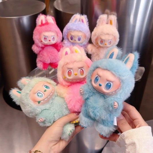 A box of six different labubus