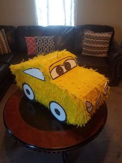Yellow Disney Car from cars 3 piñata