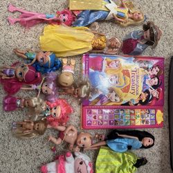 Dolls And A Story Book K