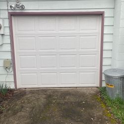 8’ by 7’ garage door w/ opener