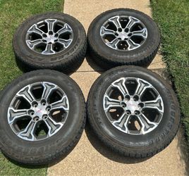 GMC Sierra OEM Factory Wheels with good all terrain tires!