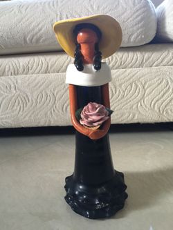 Ceramic lady with flower from Mexico 13 1/2” H x 5” W