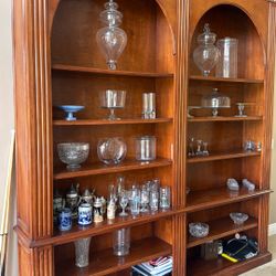 Humongous Custom Built Shelving With Crown Golden Molding Hardwood Brown