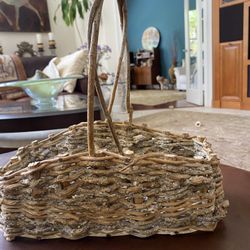 Very Cute wicker basket includes two small plastic pots for planting or can be removed as seen by the pictures