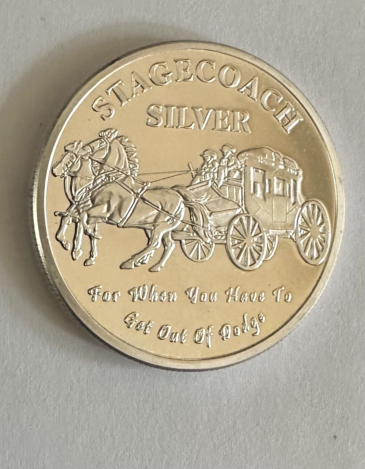 1 Oz .999 pure Stagecoach Silver round- 1/4 Fractional