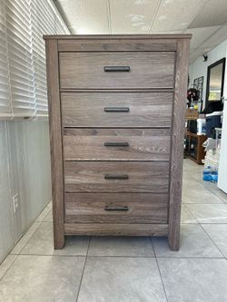 Ashley Tall Dresser in good condition