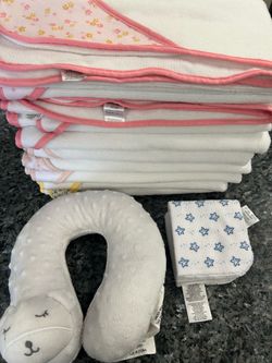 10 blankets, 3 baby towels, and a cervical support pillow.