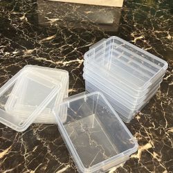 5 Plastic Storage Containers With Lids. Hand For Size Reference 
