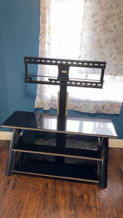 Tv  stand with 3 shelves.