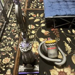 2 Dyson Vacuums 