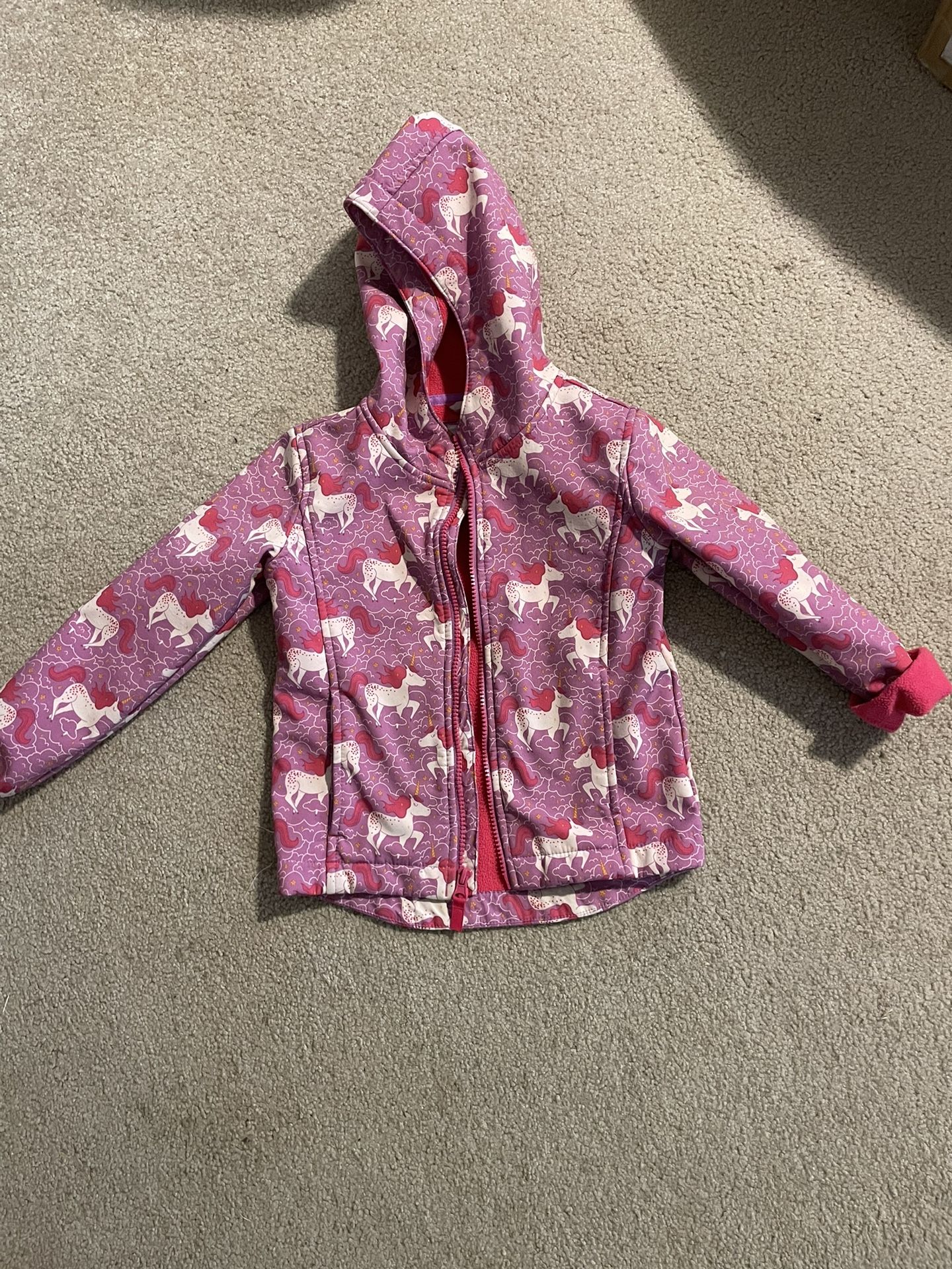 Like New girls size 5T Rain Jacket. Cat & Jack brand