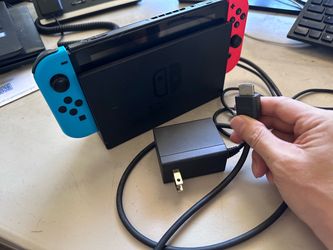 Nintendo switch with docking station plus 4 games