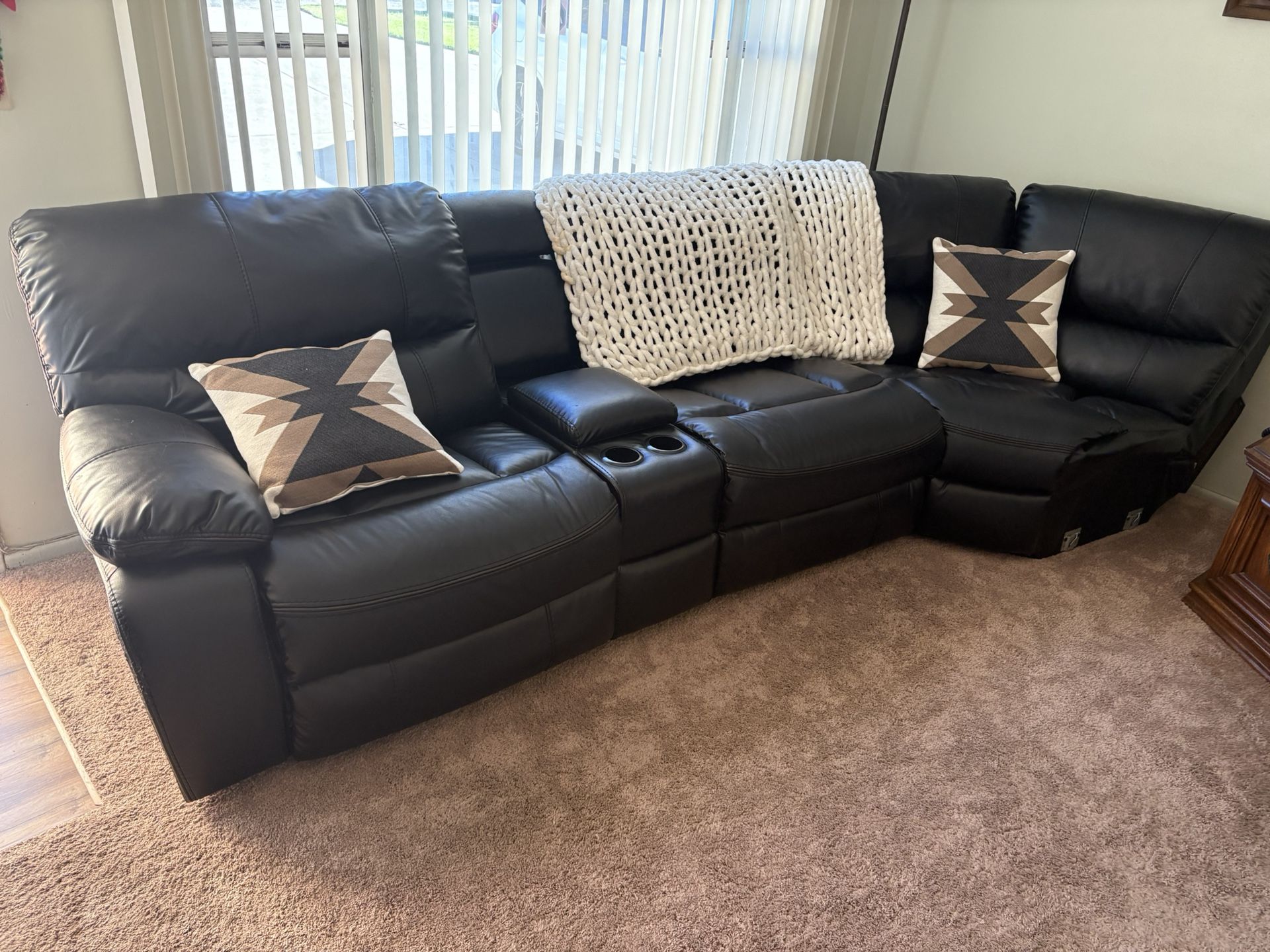 Black leather couch w/ 2 recliners