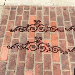 These are rod iron decorative ornate pieces