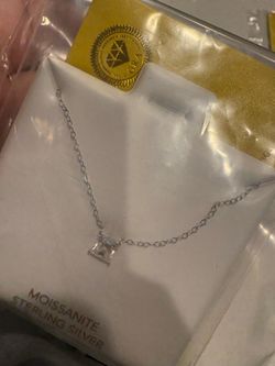 Moissanite sterling silver necklace with gra